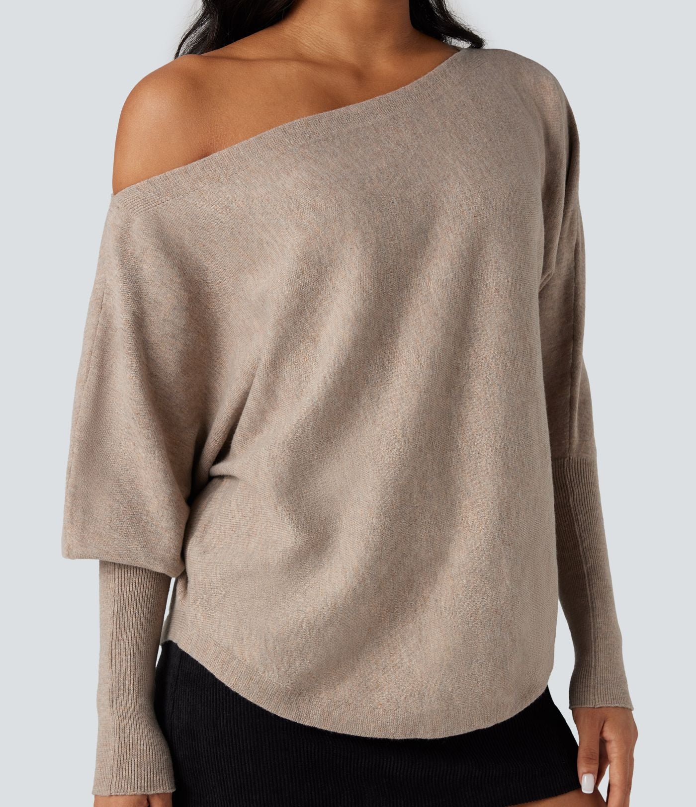 Pull une épaule manches chauve-souris ourlet arrondi