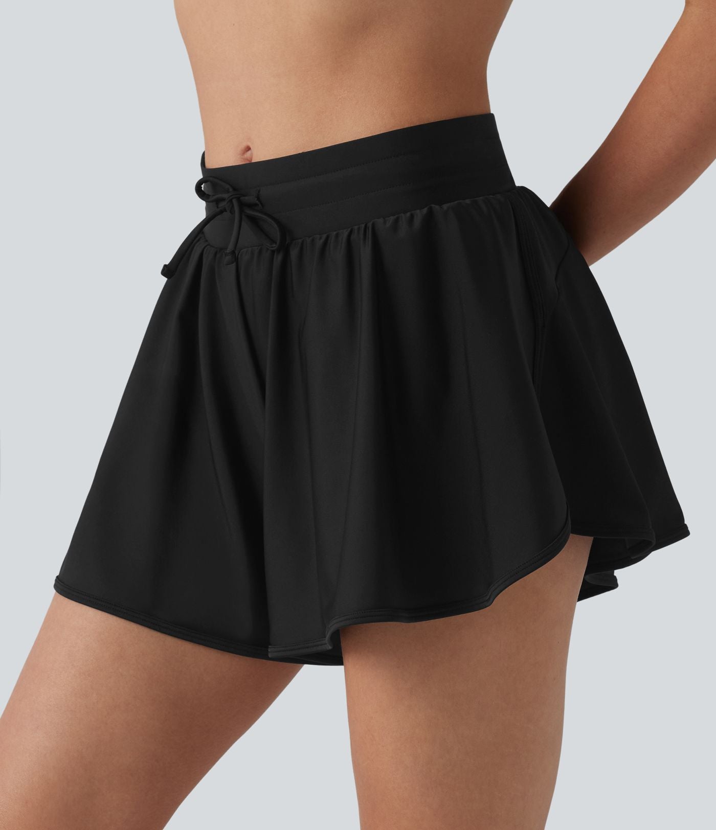 Short de bain 2 en 1 taille mi-haute ourlet arrondi fendu avec cordon de serrage et poches