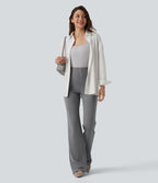 Pantalon tailleur évasé à rayures taille haute avec poches