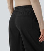 Pantalon taille mi-haute à cordon, jambe tombante en velours côtelé avec poches