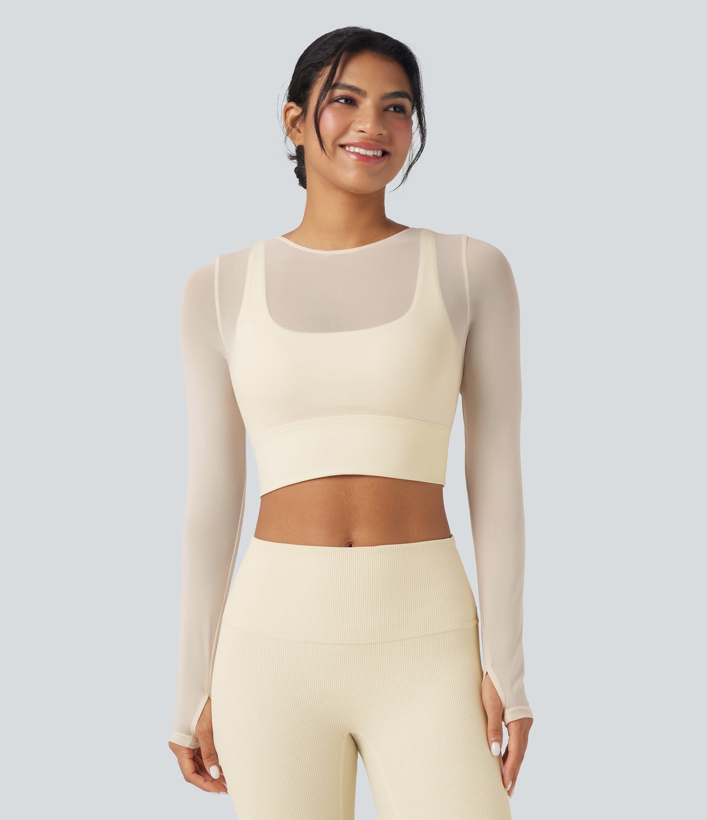 Haut de sport yoga cropped 2-en-1 manches longues mesh contrastant à trous pouces