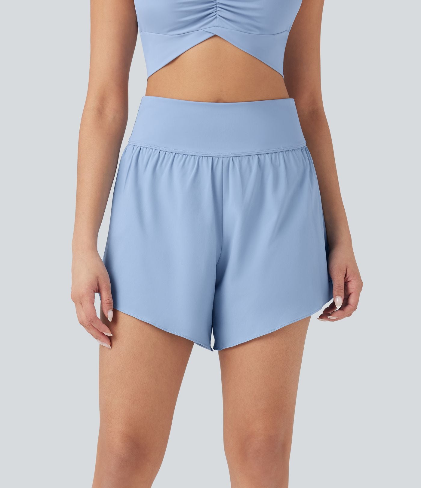 Short 2-en-1 de course gainant taille haute avec points réfléchissants, ourlet croisé et séchage rapide 12,5 cm avec poches SoftlyZero™