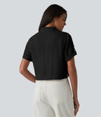 Chemise courte col classique manches courtes retroussées en mélange lin avec poches