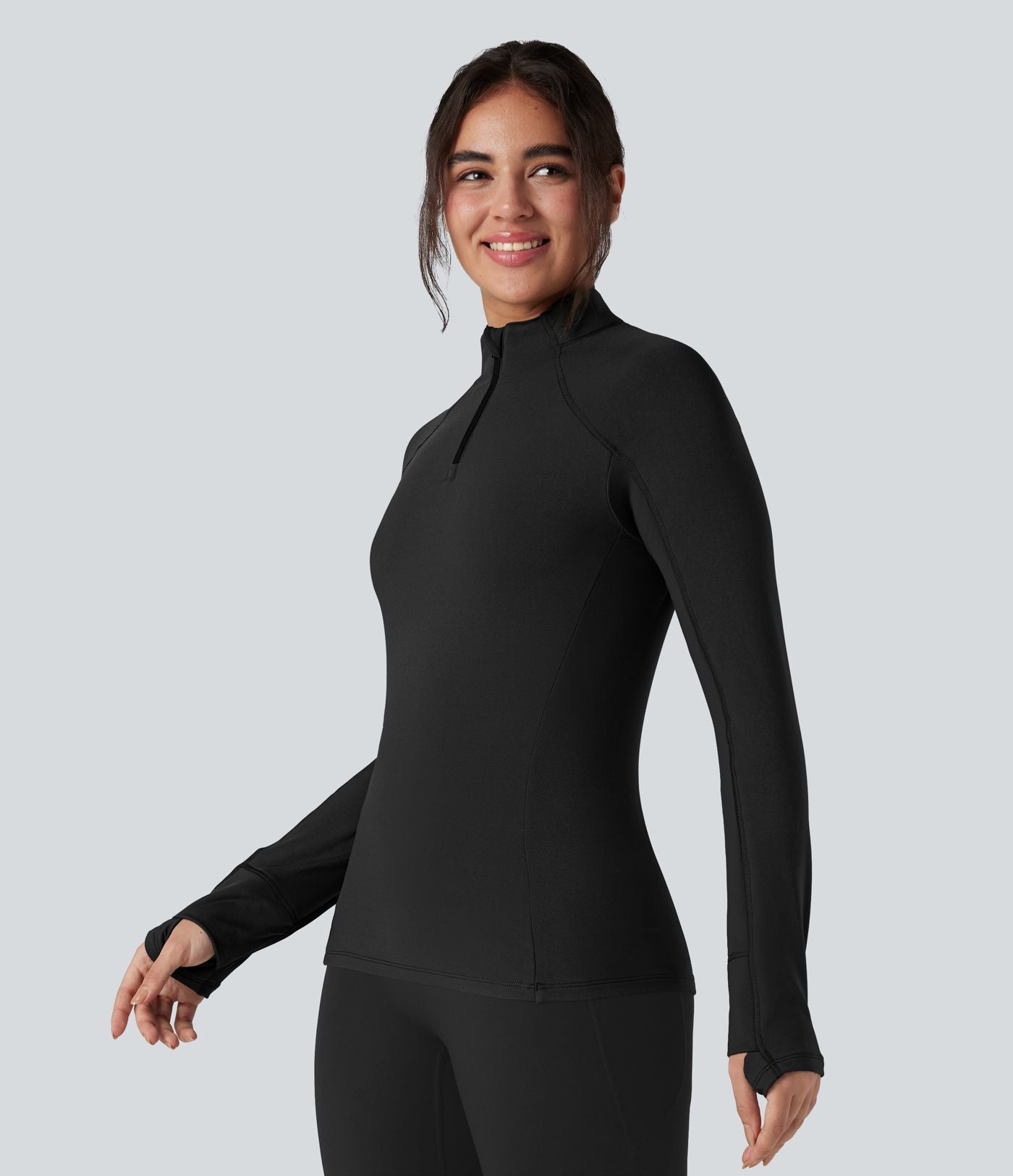 Top de sport randonnée polaire col montant demi-zip manches longues avec trous pouces