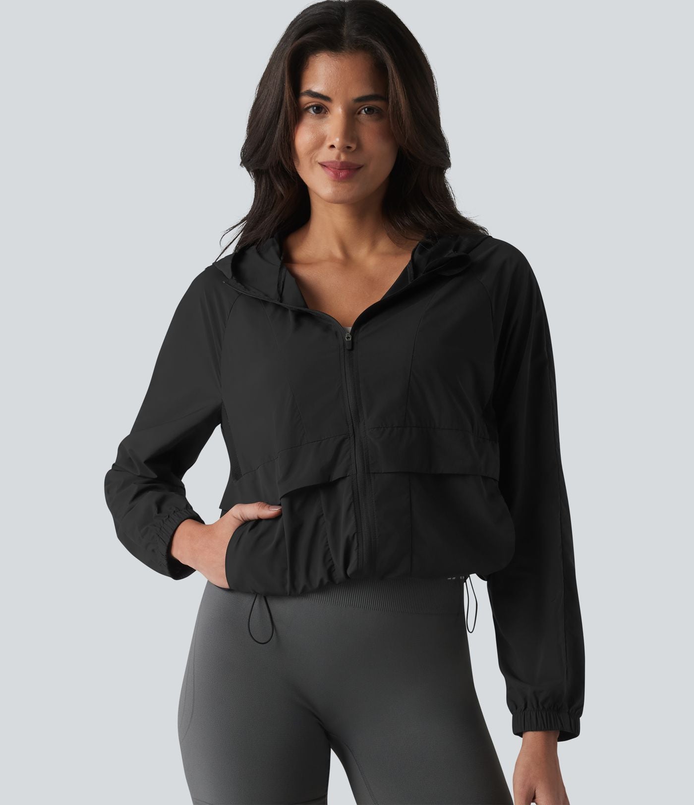 Veste de course à capuche à manches longues avec empiècements en mesh contrasté et poches – Protection UPF 50+