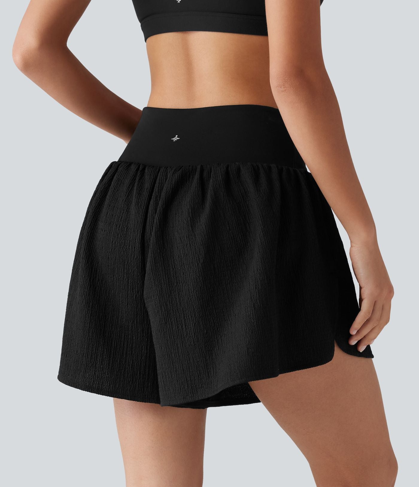 Short de running 2-en-1 taille haute croisée en tissu froissé avec ourlet fendu et poches
