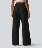 Pantalon large fluide casual en coton et lin taille haute avec poches