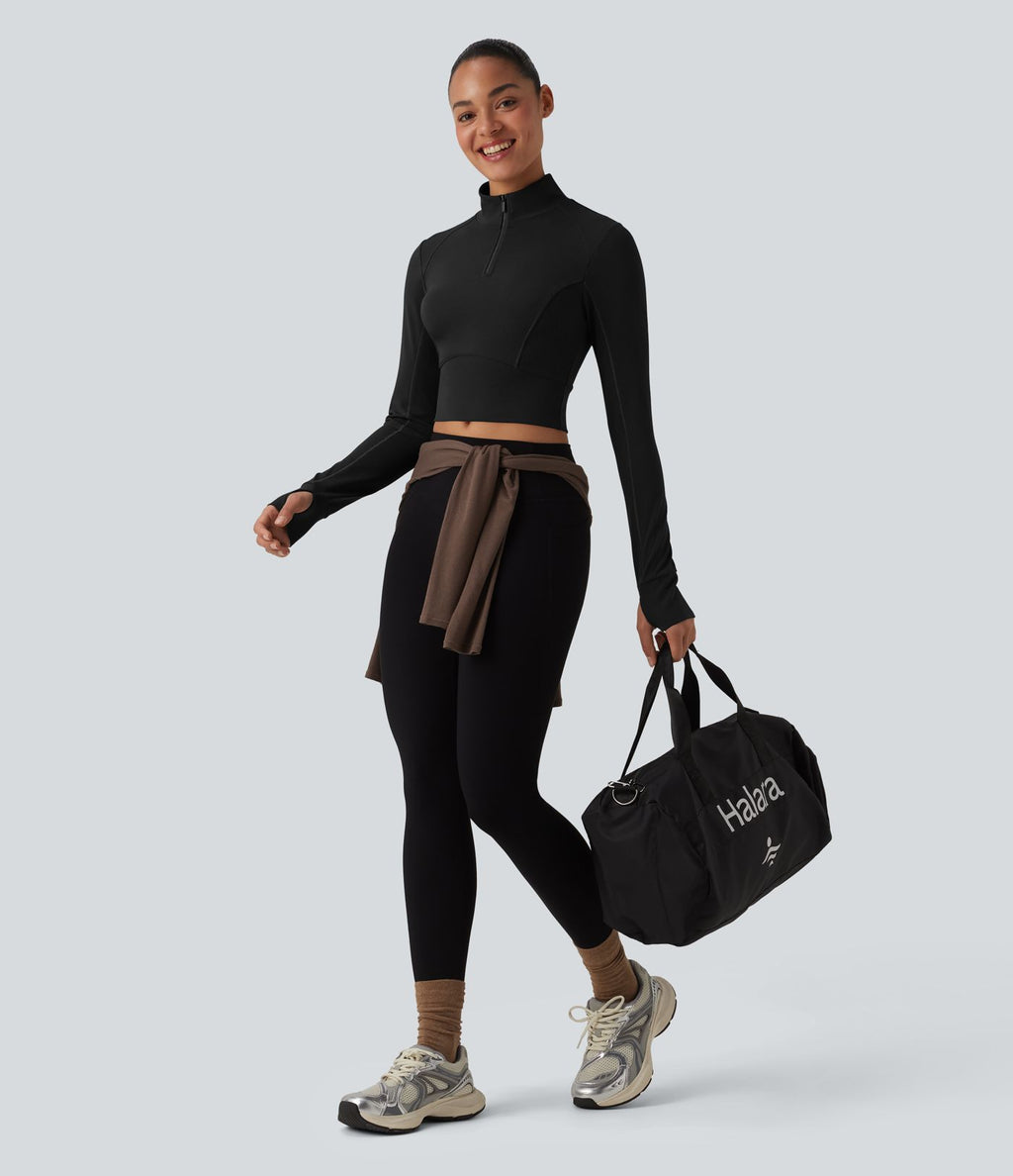 Haut de sport court col cheminée demi-zip manches longues avec passe-pouces