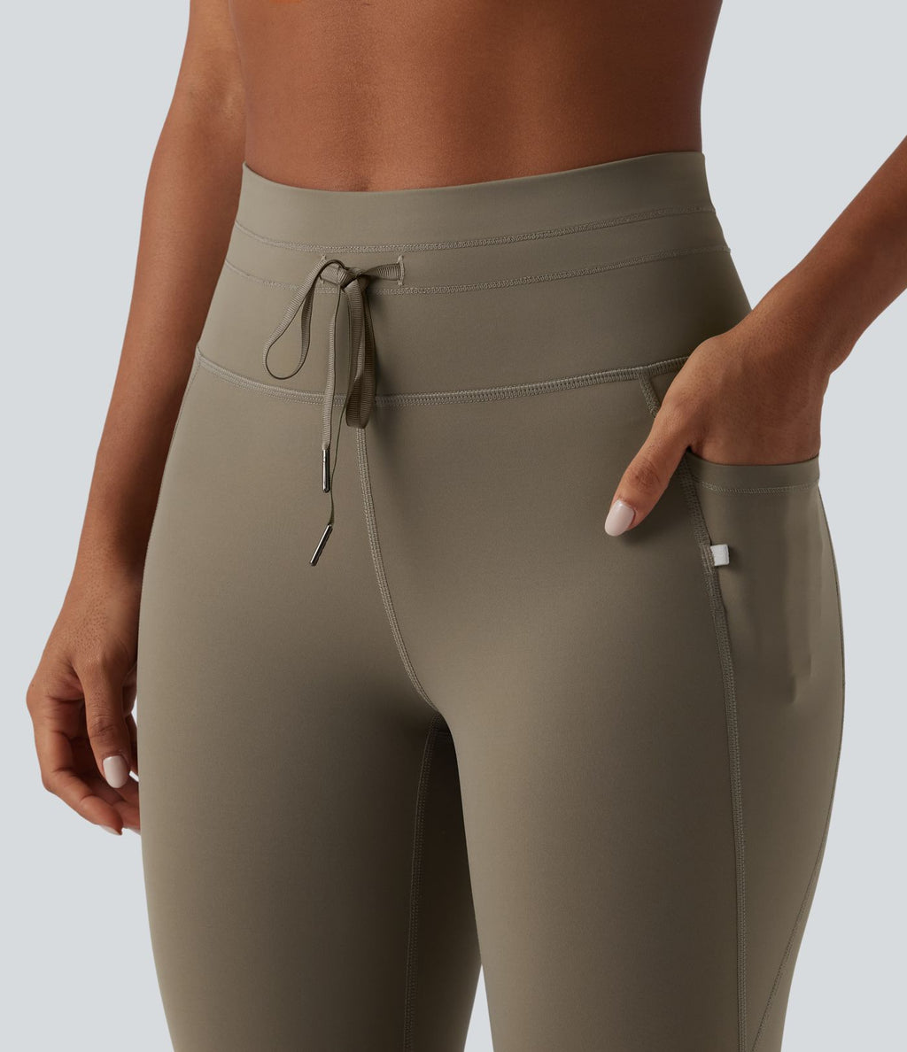 Legging 7/8 de yoga taille haute avec cordon de serrage uni et poches