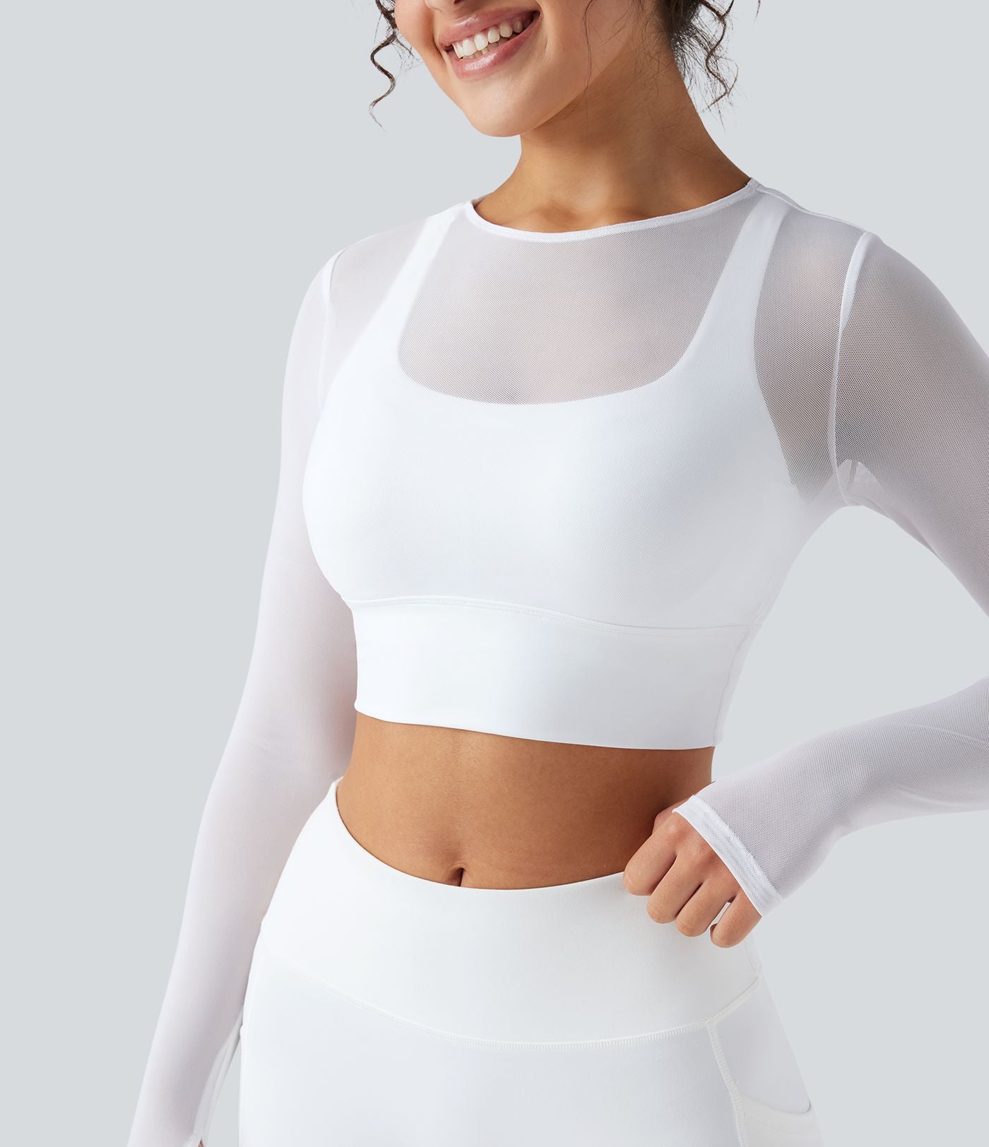 Haut de sport yoga cropped 2-en-1 manches longues mesh contrastant à trous pouces