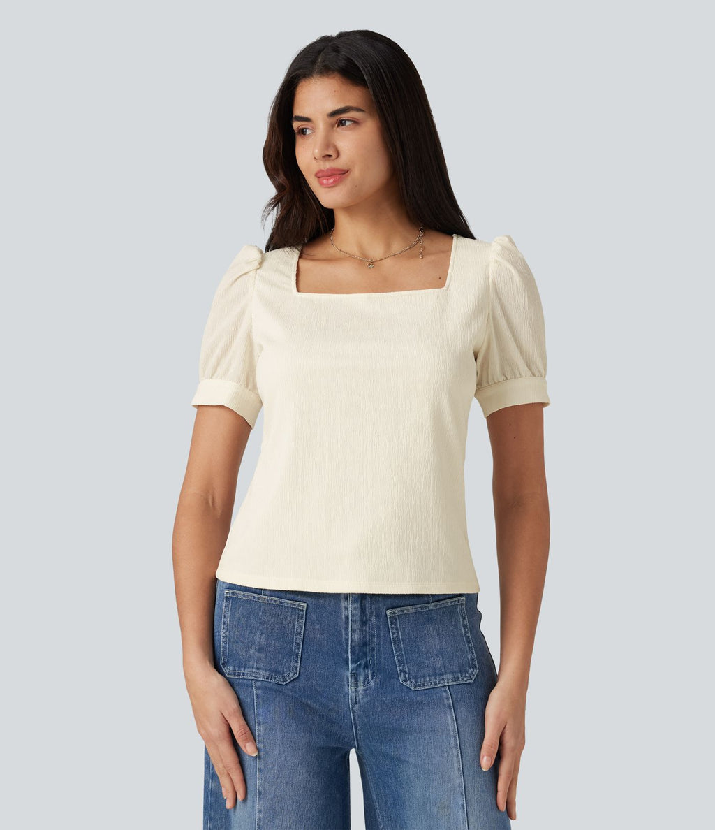 Blouse habillée col carré à manches bouffantes et tissu texturé