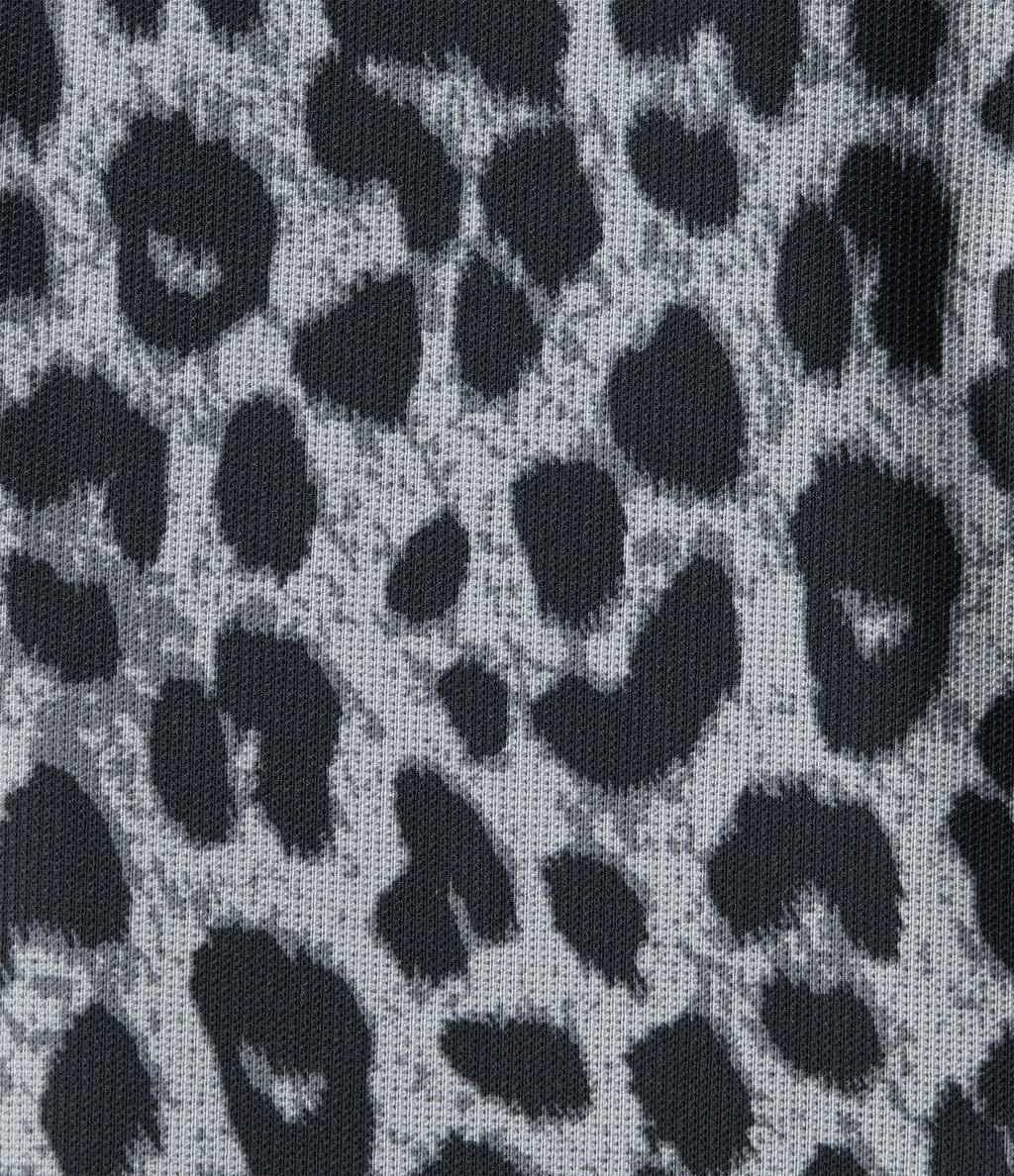 Pantalon flare taille haute en tissu gaufré imprimé léopard avec poches