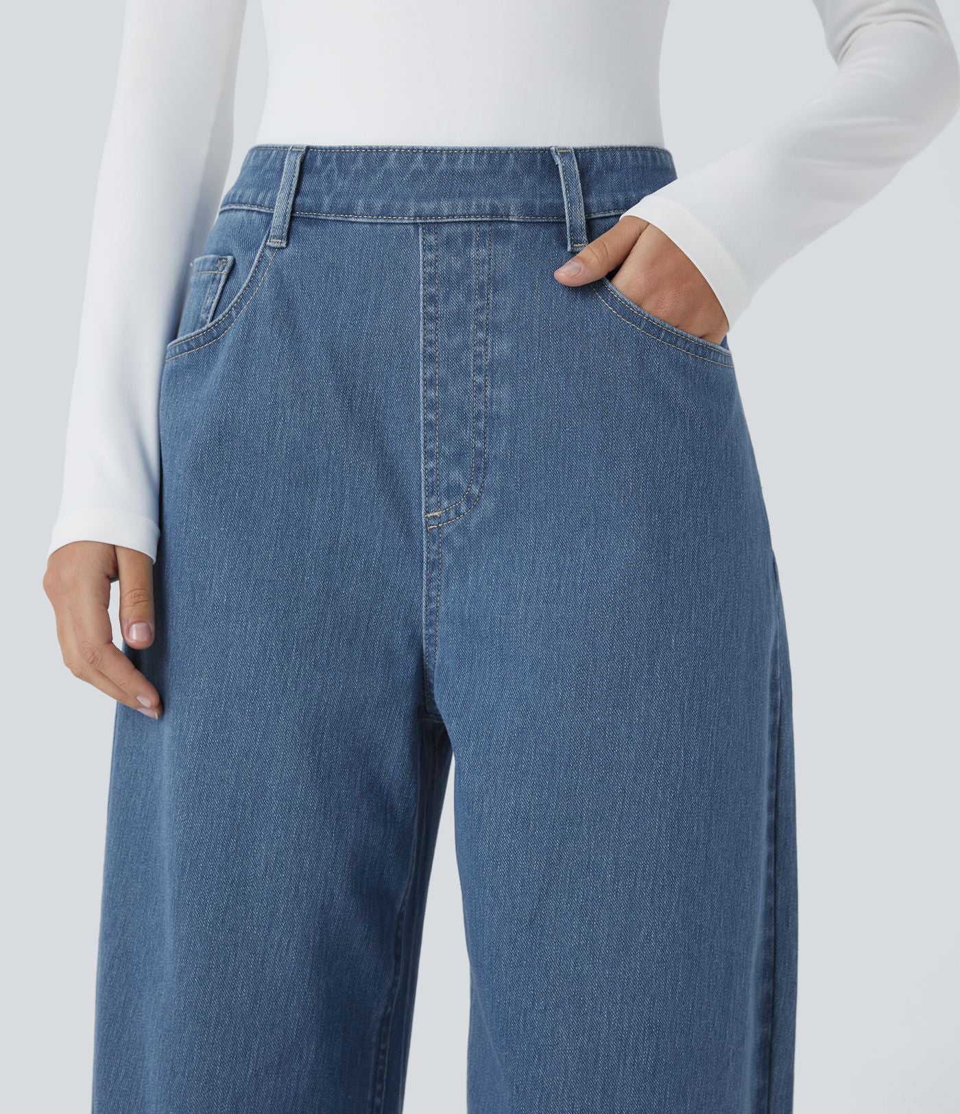 Jean ample délavé taille haute en maille extensible avec poches multiples