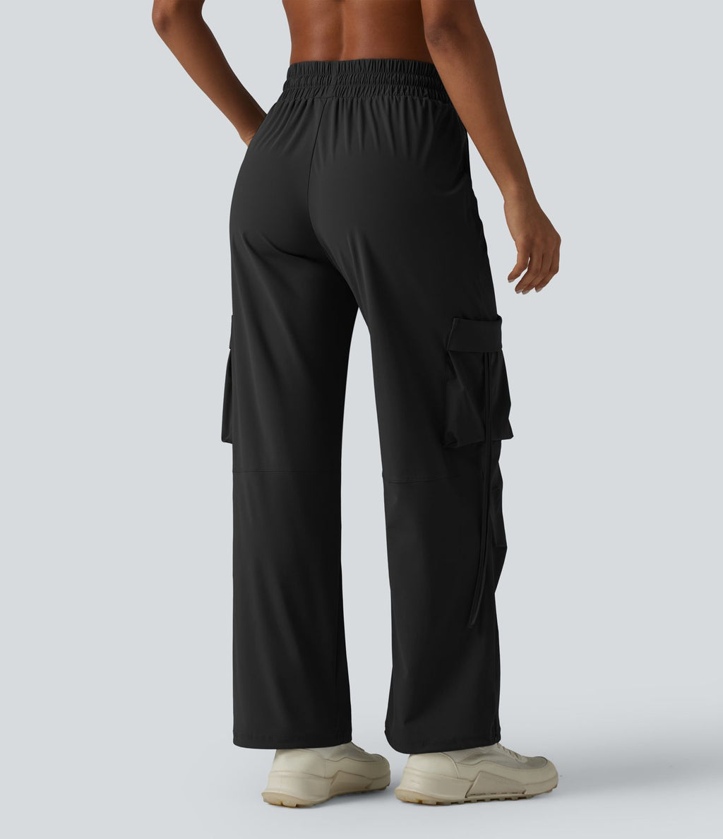 Pantalon cargo large fluide d'entraînement taille haute avec cordon de serrage, séchage rapide, à effet frais InstantCool et poches, protection solaire UPF40+
