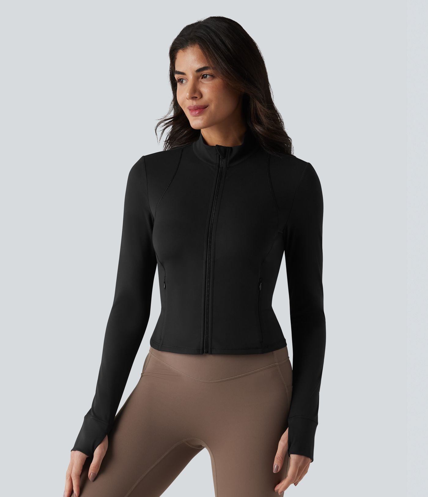 SoftlyZero™ Plush Veste de yoga col montant à manches longues avec trous pour les pouces, dos torsadé, empiècements en mesh respirant et poches