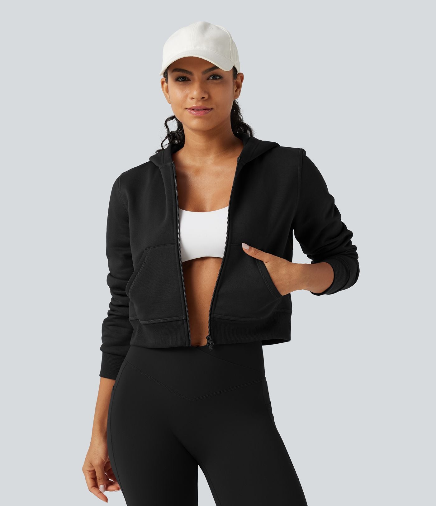 Veste de sport polaire à capuche, manches longues, zip et poches