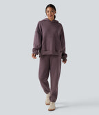 Sweat-shirt de sport casual oversize en molleton à capuche et manches longues avec poches