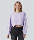 Sweat-shirt décolleté bateau à manches longues ourlet asymétrique