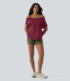 Top de yoga à une épaule, manches courtes, ourlet asymétrique et soutien-gorge intégré à séchage rapide