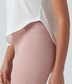 Haut de sport yoga asymétrique à une épaule manches courtes ourlet arrondi asymétrique séchage rapide