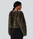 Manteau cape fausse fourrure col V manches longues