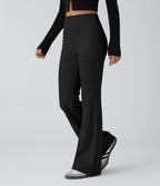 Pantalon décontracté évasé en maille côtelée à taille haute et poches zippées latérales
