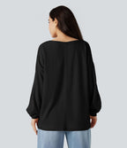 Sweat-shirt gaufré col échancré manches longues