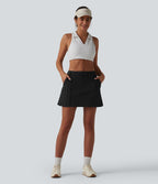 Jupe mini trapèze de golf 2-en-1 taille mi-haute avec poches