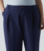 Pantalon grande taille en popeline stretch taille haute, plissé avec ourlet roulotté, longueur 7/8, coupe fuselée, avec poches