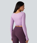 Top de sport yoga court push-up mousse col échancré manches longues avec trous pouces croisé