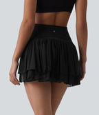 Jupe de danse mini 2-en-1 en mesh respirant à volants et ourlet asymétrique taille haute avec poches