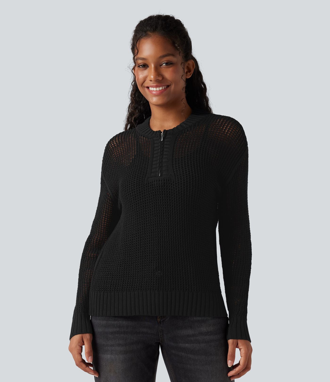 Pull ajouré demi-zip col rond manches longues